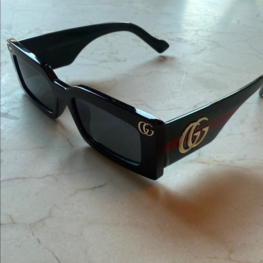 Gucci Black and Gold Sunglasses